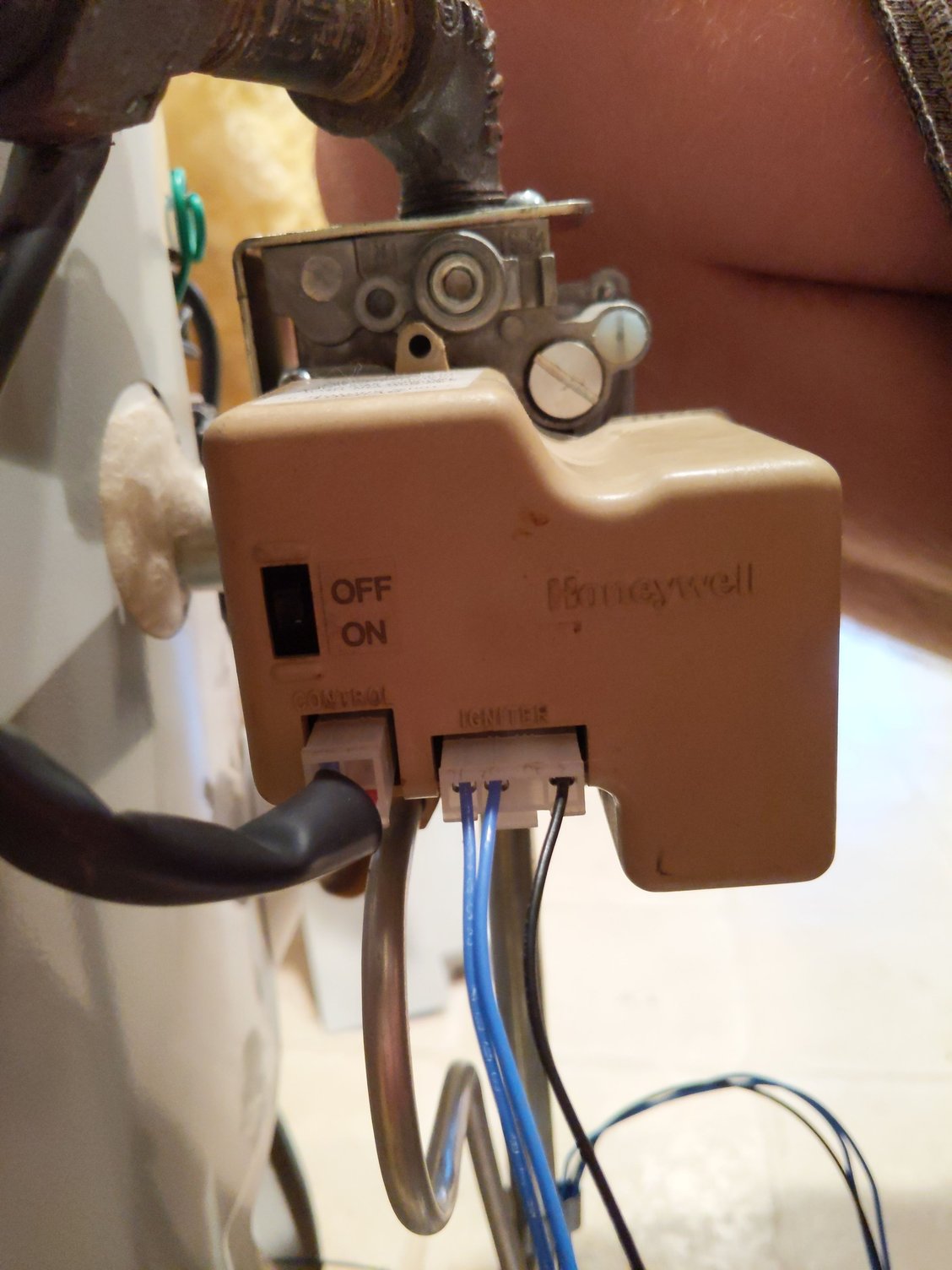 Natural gas water heater runs continuously, burner doesn't stay lit