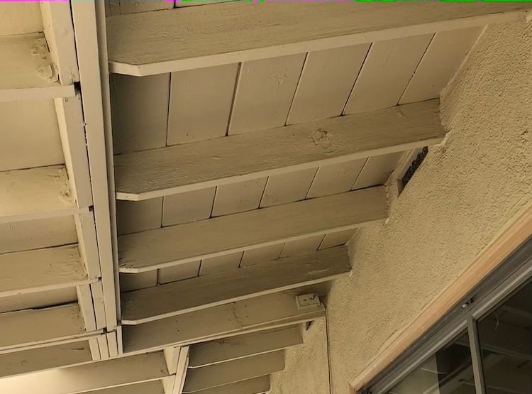 How to fix a covered patio improperly attached to the fascia board? See