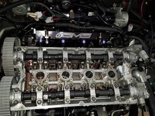 Cam Gears installed and torqued to spec.  FIC 2150cc injectors inserted into manifold with AMS fuel rail.