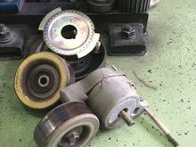 The pulleys and tensioners look pretty good and bearings are still spinning smoothly without much indication of corrosion or rust. They went right back in.