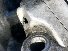 Closeup of the irregular shaped hole left from the casting and machining processes.