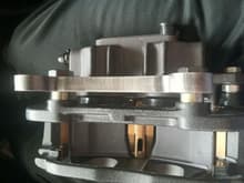 Bracket connected to Caliper with spacers