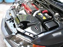 Mishimoto carbon intake made to fit my 9.  All stock air box brackets removed for this to fit.