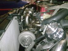 My old setup: 3582r Inline short runner manifold and Tial 44mm wastegate being mocked up at Inline Racing (Houston,TX)