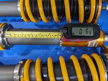 Rear is therefore 6" and 1/8 for how Ohlins ships it which is -25mm from stock.