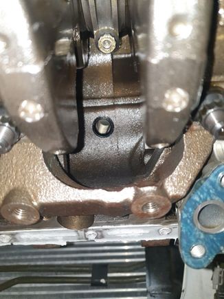 Inside shot. I drilled this in place with the engine assembled. I just removed the oil pan and baffle/windage trays.