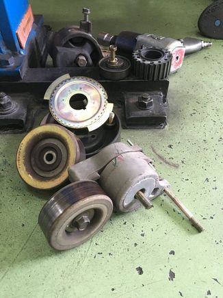 The pulleys and tensioners look pretty good and bearings are still spinning smoothly without much indication of corrosion or rust. They went right back in.