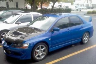 Sadly enough, this is still the only picture I have of her, and it was taken the day I test drove it for the first time before I bought it.  Hopefully I can get her waxed soon now that the weather is getting better and take some real pics.