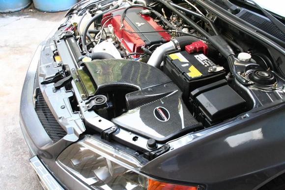Mishimoto carbon intake made to fit my 9.  All stock air box brackets removed for this to fit.