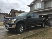 2018 XLT FX4 XTR 302a in Guard metallic. The day I picked it up and now rig a level/lift and upgrades tires.  My firstF150