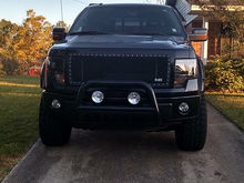 Changed out her grill and added a bully bar w/ KC lights