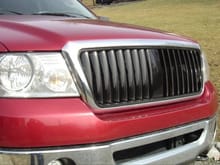 Black and chrome Lincoln style grille