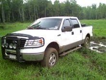 Being retarded. Don't stop to put your truck in 2WD!