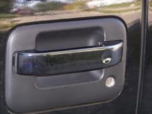 Chrome overlay door handle painted with Black chrome kit