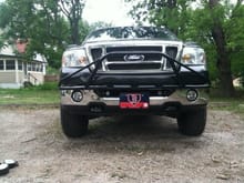 Front End w: PreRunner Bar
After I Plasti Dip'd my grill. Bumpers are next I think. Harley Headlights to match!