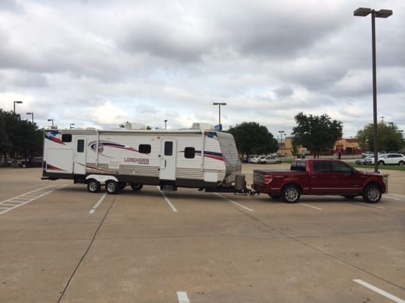 2014 Crossroads 32' with bunkhouse and double slides.  Truck is 2014 F-150 Platinum w/ Eco-boost, factory tow package, using WD hitch.