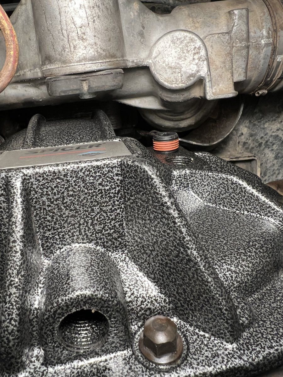 Are there any aftermarket front diff covers with drain plugs? Ford