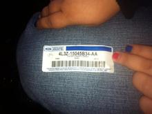 Part number for the rear bracket needed to bolt down the Flow Through console. 

I thought the original bracket that held the jumpseat could be re-used, but it would not let the console bin lower down far enough to sit on the floor properly.