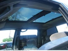4 1/2 feet of glass. front window slides over the rear one. 4 individual sun shades. visit webasto.com to find a dealer.