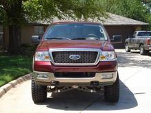 After 4" Rancho suspension lift, 33" Pro Comp Extreme All Terrain tires, K&amp;N Cold Air Intake, MagnaFlow Exhaust, and Edge Evolution.