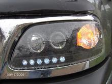 Close up of headlights
forgive the quality it is raining
