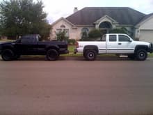 my truck against my little brothers.. he has a 4 inch procomp and 35&quot; TOYOS. thats how much higher fords sit than chevy.
