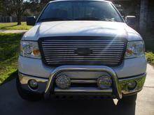 before the new patriot decals, New roush grille, getting black headlights and then seeing if i should ptm the surround