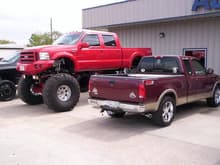 My Truck And &quot;Big Red&quot; (the day i took my truck to get a lift, but not lifted in this picture)