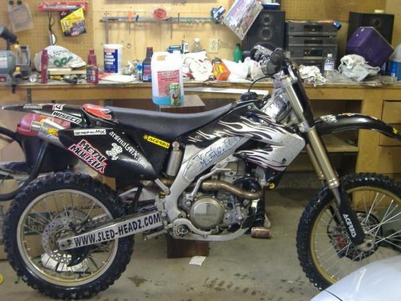 225 pounds dry and 64hp to the rear tire :-)