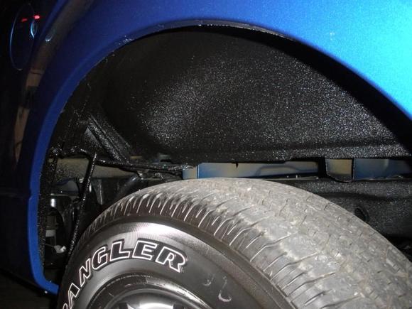 Rear wheel wells Line-X'd