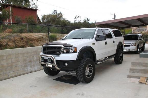 Fender flares, Blacked bumper, HD lights