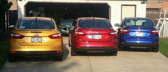 All 3 focus's and the 13 escape sitting in the garage