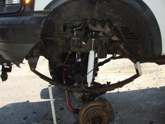 Fixing spindle nut, and wheel bearing