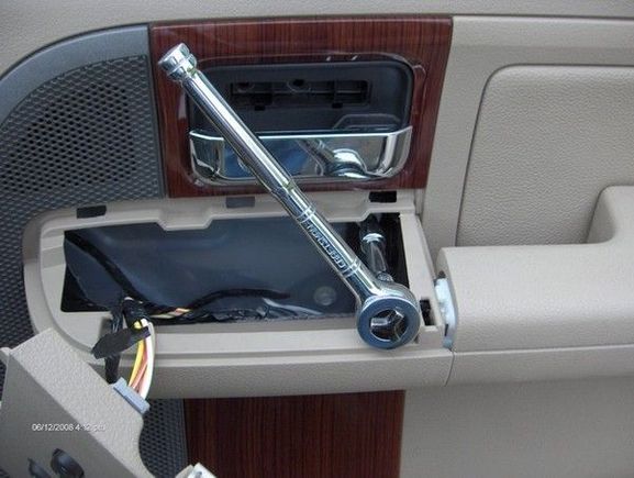 3c - Remove the bolt behind the arm rest