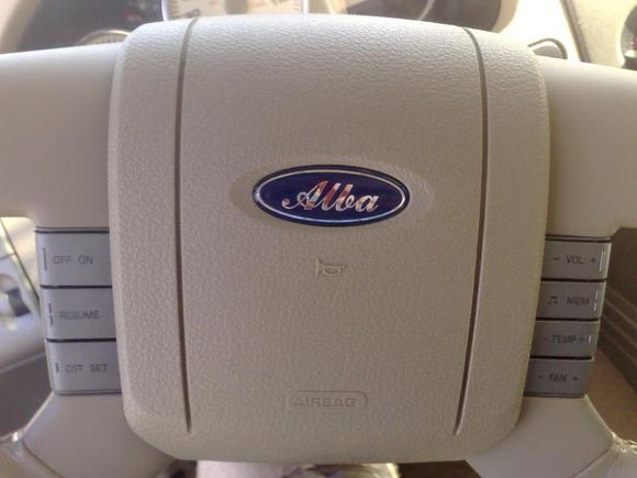 Alba steering wheel emblem