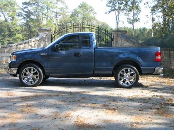 Full side view of Blue with 22" American Racing "Magnet" rims.