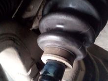 Notice greased area of axle that has been displaced from the inside of the boot