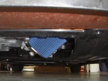 my New custom Intake for the 09 FIT filter peaking out under car.