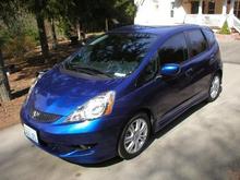 Fit tinted windows. Huge difference on heat in the car.