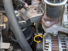 Showing where arm goes to get the.. 18mm, or was it 19?
At any rate, combo wrench. Had to use the open end too, and flip it in order to get clearance. The wrench will need to be leaned towards passenger side (you) to clear the riff-raff.