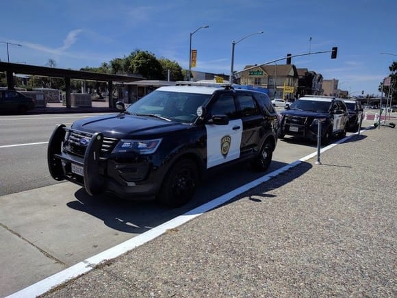 Three BART police SUVs taking up the loading zone next to Lake Merritt BART (and across the street from their police station parking lot). Photo: Streetsblog/Rudick
