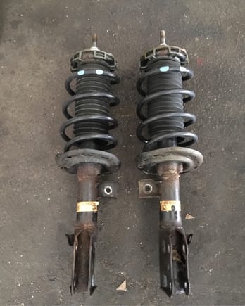Old struts and springs. The struts were *completely* blown with no rebound. Glad I changed them! 