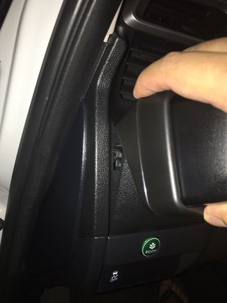 Hooks over the edge of the cup holder