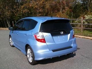 TIDE WATER BLUE 2010 WITH SIDE MOLDING AND TINTED WINDOWS  -   WINDOW GUARDS