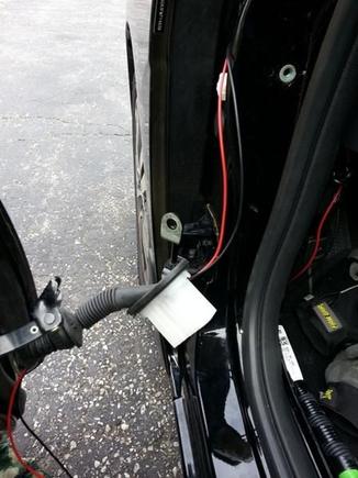 weatherproof grommet between door and firewall