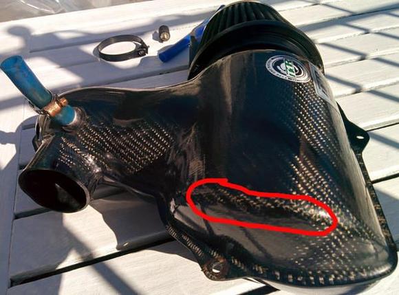 Intake side, note there are scratches on the corner hard to see.No impact on performance or function.
