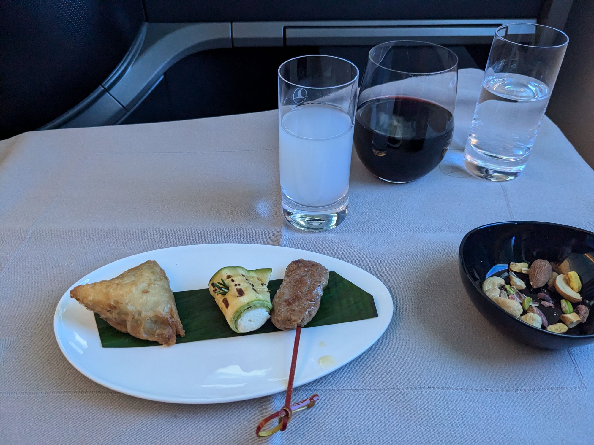 Canapes were good but not as good as on the ex-YUL flight. Samosa was warm but not super crispy. Everything tasted fine but nothing exciting