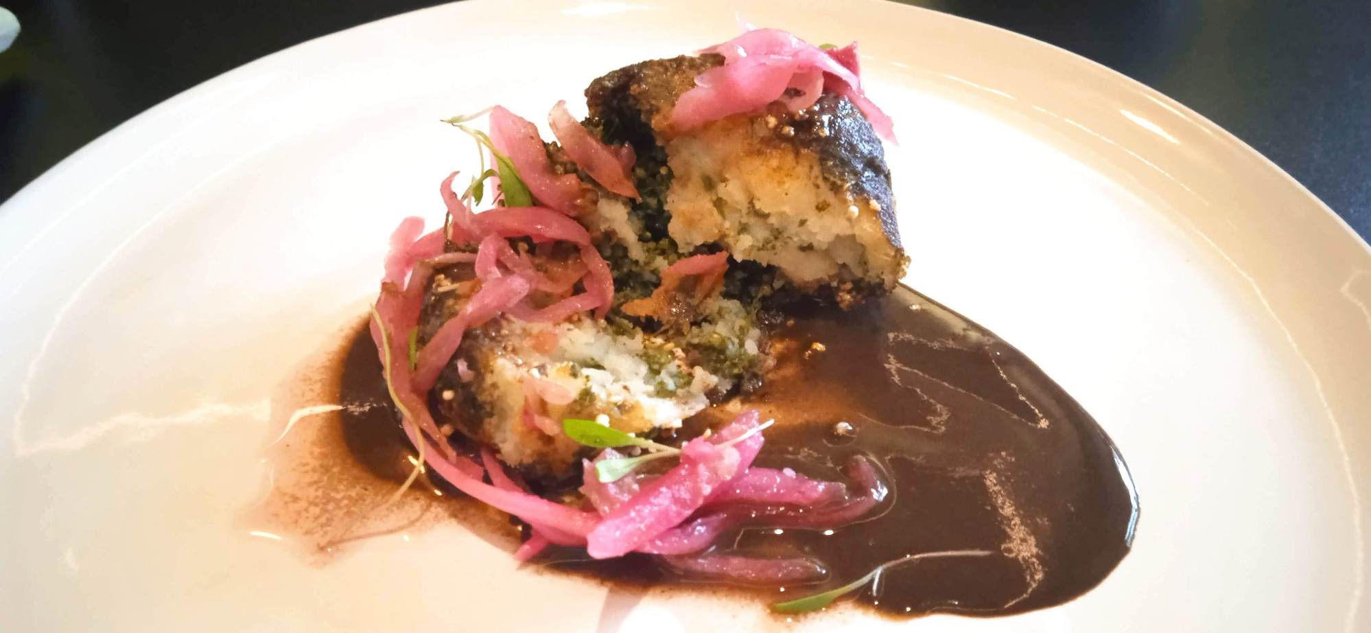 Croquette with mild hot spice + mild chocolate Oaxaca mole ...normal dish has 2 croquettes.  Asked for 1, and took half-order of another dish