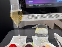 Excellent on-board service and enjoyable food and wine.  Choose the burrata appraiser, lamb shank main and Eton mess dessert. For the light meal had prosciutto, the burger (from the lunch menu) and mango desert.  All washed down with LPGS and a most decent Stint-Emilion Grand Cru. 

Despite the current limited selection in First was most satisfied with the food and wine on board.