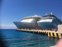 Flew BA to Miami and boarded the ship on the right (Celebrity Silhouette). The Royal Caribbean ship is Harmony of the Seas - absolutely huge. Picture taken from Margaritville in Cozumel, Mexico 